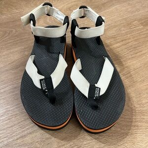 Teva Black Footbed Sandals with Cream Straps and Orange Accents